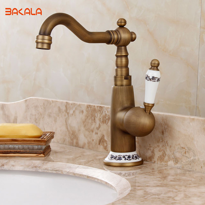 whole and retail deck mounted single handle hole bathroom sink mixer faucet antique brass and cold water face mixer tap